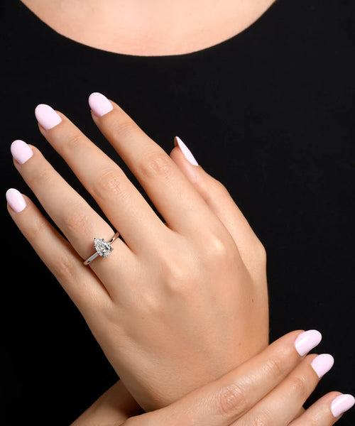 Pearlescent Radiance: 1.23 CT Pear Shaped Solitaire Engagement Ring in White Gold