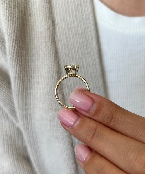 Golden Radiance: 1.70 CT Oval Solitaire Engagement Ring in Yellow Gold