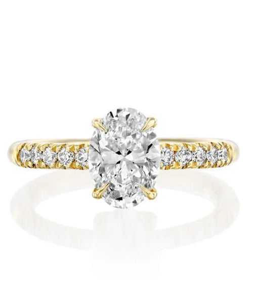 The Pinnacle of Elegance: 1.81 CT Oval Diamond with Side Stones in Yellow Gold