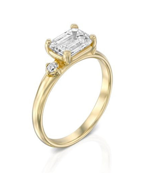 Three Stone Majesty: 1.55 CT Emerald Diamond Ring in Lustrous Yellow Gold