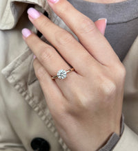 Celebrate Love: 1.25 CT Diamond Engagement Ring Set in Lustrous Rose Gold