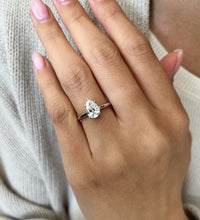Pearlescent Radiance: 1.23 CT Pear Shaped Solitaire Engagement Ring in White Gold